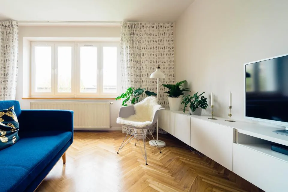 Bright living room with herringbone wood floor